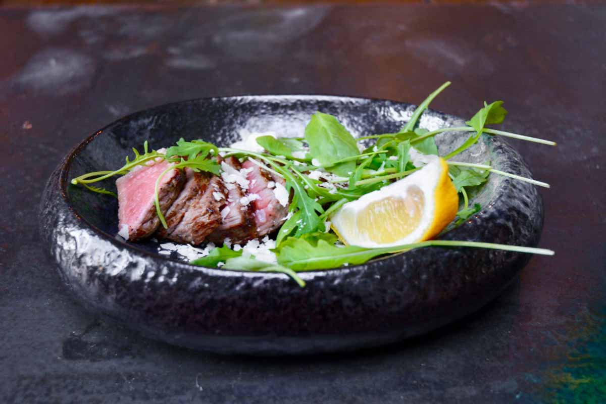 tagliata di manzo with arugula and lemon